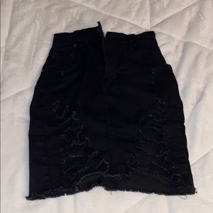 Ripped black denim skirt